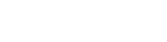 A woman wearing a face mask and traditional attire smiles outdoors.